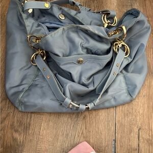 Chic Blue and Gold Shoulder Bag with Elegant Design